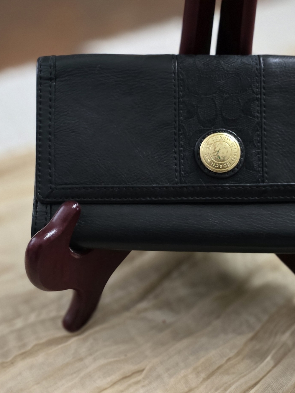 Coach Black Leather Wallet with Gold-Tone Medallion